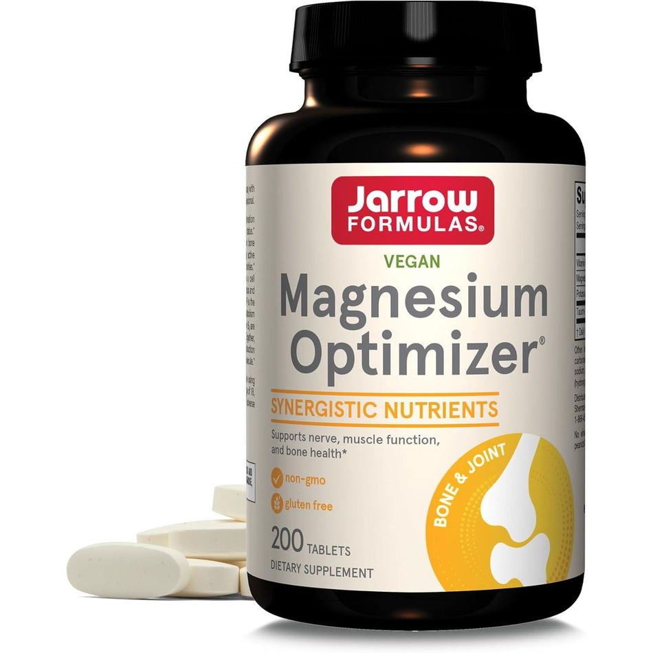 Recipient plastic negru Jarrow Formulas Magnesium Optimizer cu capac negru, logo roșu-verde, text Vegan, titlu mare Magnesium Optimizer, banner galben Synergistic Nutrients, icoane non-GMO și gluten free, badge Bone & Joint galben, 200 Tablets, tablete albe vizibile alături. Formulă sinergică vegană cu malat de magneziu, citrat de potasiu, taurină și vitamina B6 P-5-P pentru absorbție optimă. Susține funcția nervoasă și musculară, sănătatea oaselor și articulațiilor, reduce crampele și oboseala.
